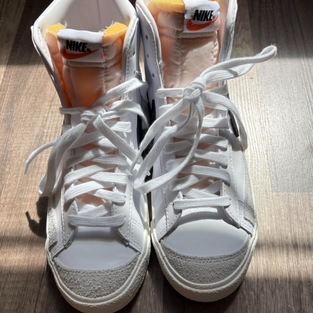 Nike White and Orange Sneakers with Classic Silhouette